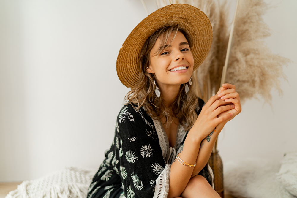 Close,Up,Portrait,Of,Woman,In,Bohemian,Dress,Sitting,On