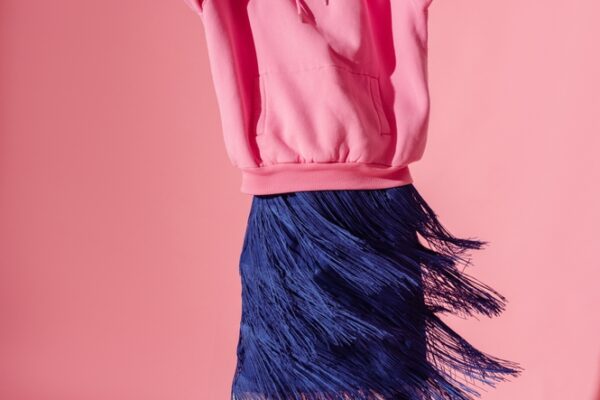 Fashionable,Confident,Woman,Wearing,Trendy,Pink,Hoodie,,Glasses,,Blue,Fringed skirt