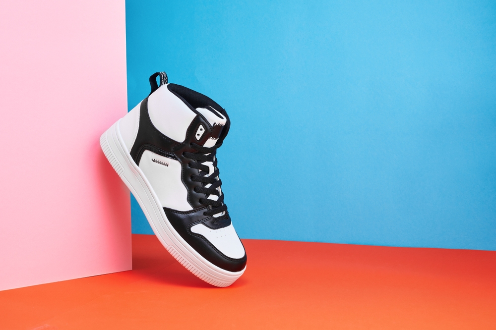 Black,And,White,Sneakers,On,A,Colored,Background.,Stylish,Style