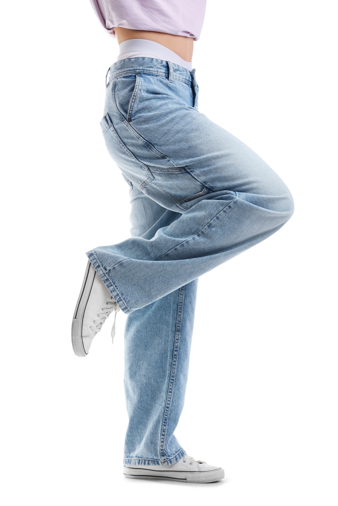 Young,Woman,In,Trendy,Jeans,On,White,Background