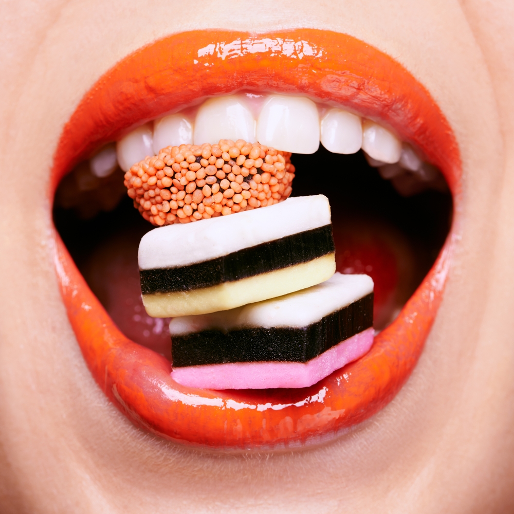 Closeup,,Lipstick,And,Woman,With,Candy,In,Mouth,,Makeup,And